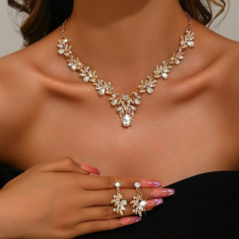 sparkling necklace, earrings, and ring