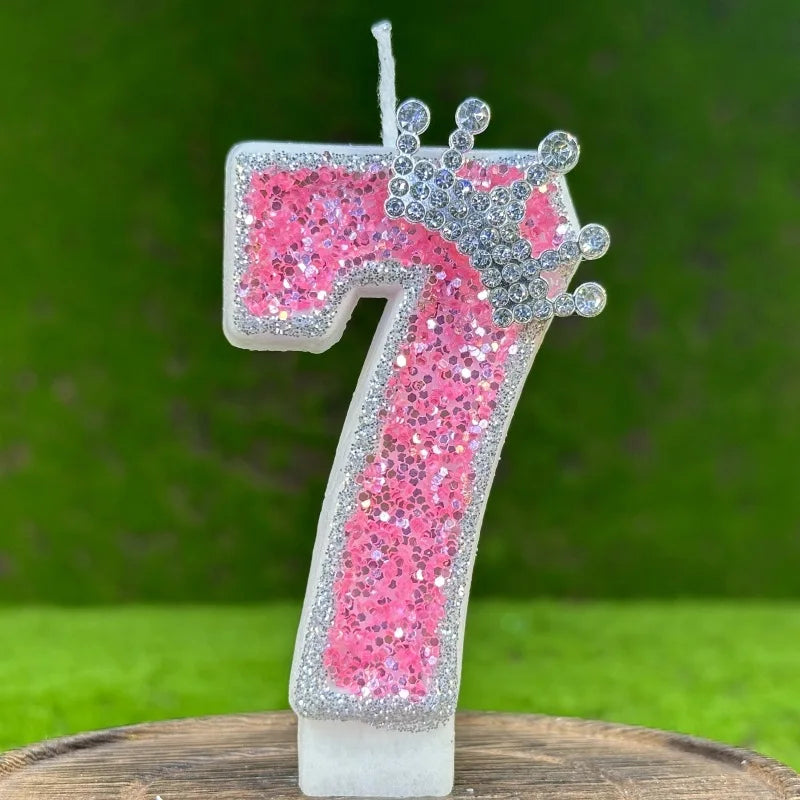 Pink and silver number 7 candle