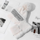 Fur lined pom pom winter hat