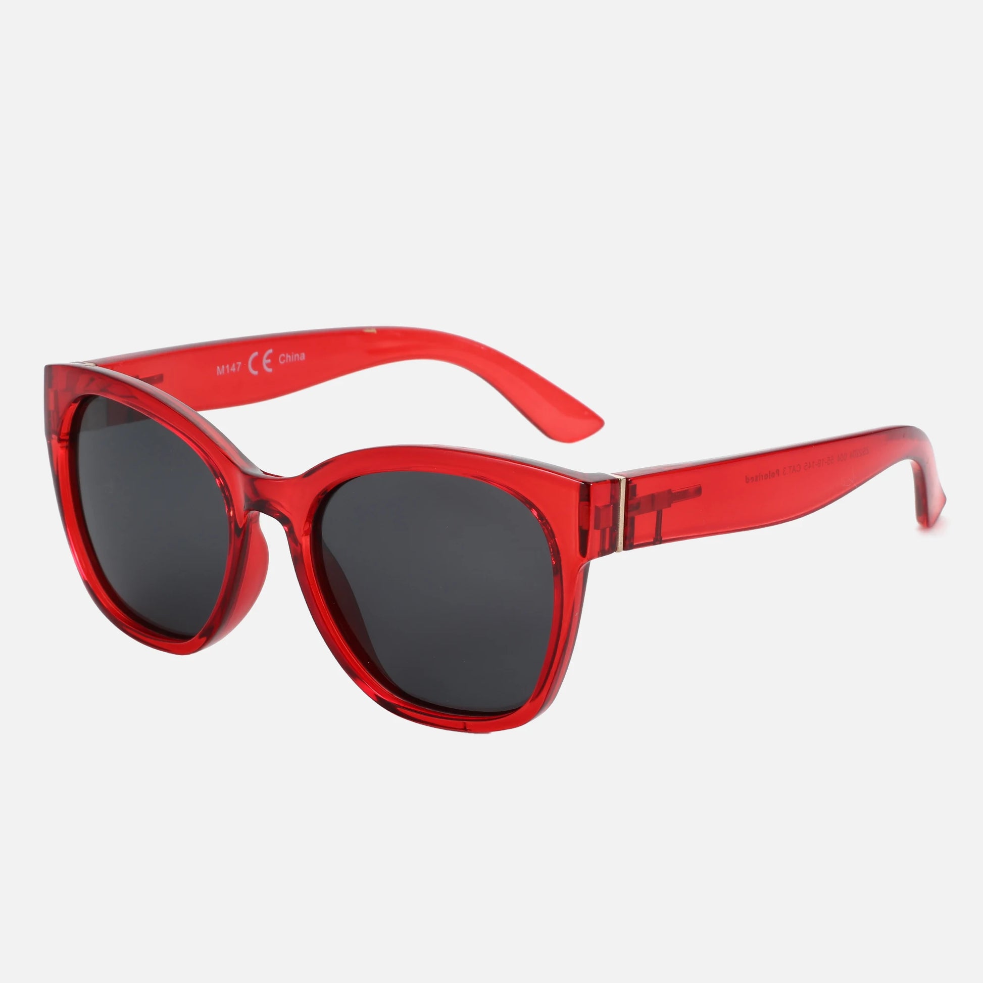 Red sunglasses with black lenses on a white background
