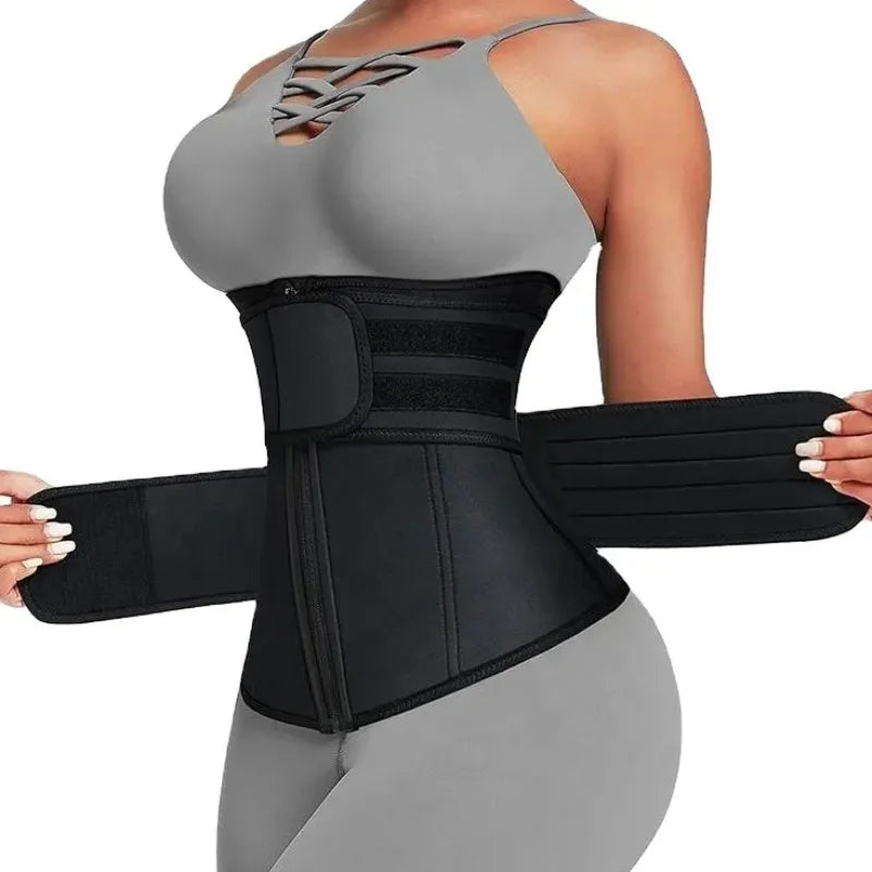 Person wearing a black waist trainer with a plain background