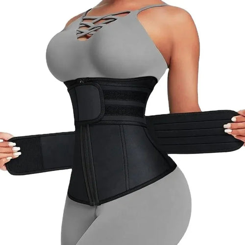 Person wearing a black waist trainer with a plain background