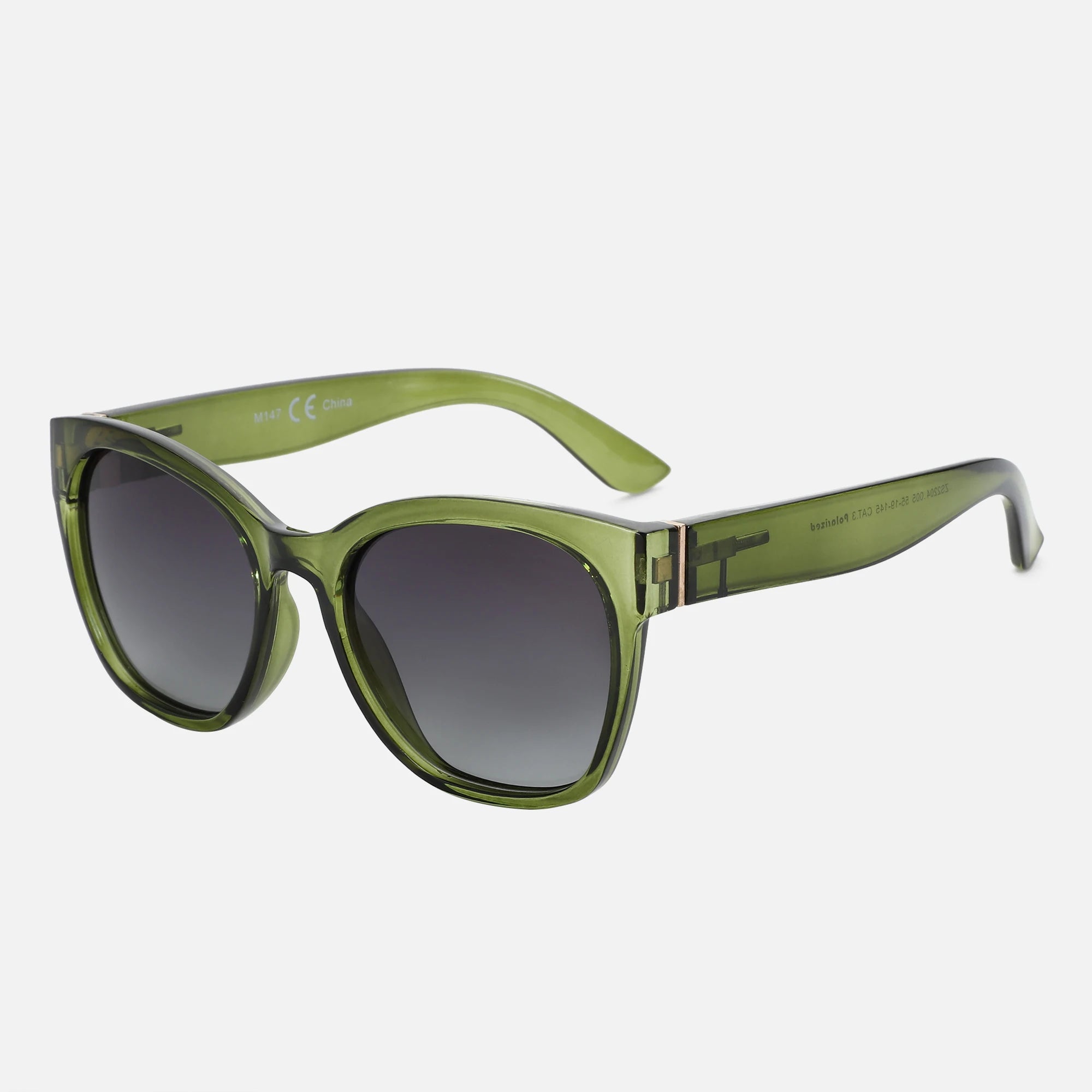 Green sunglasses with dark lenses on a white background