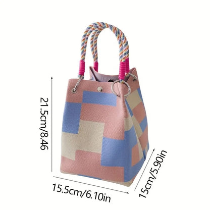 Colorful geometric-patterned bag with measurements on a white background
