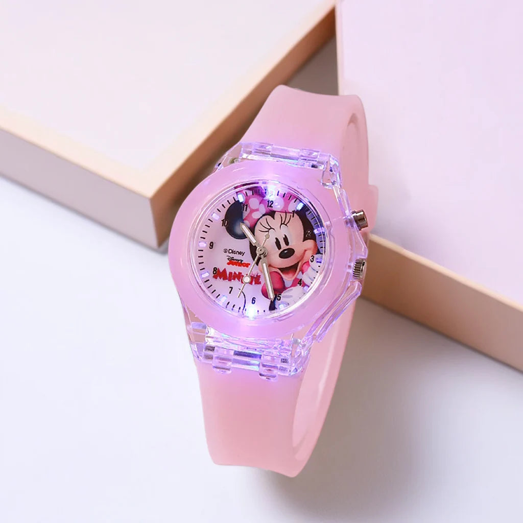 Pink cartoon-themed watch on a light background